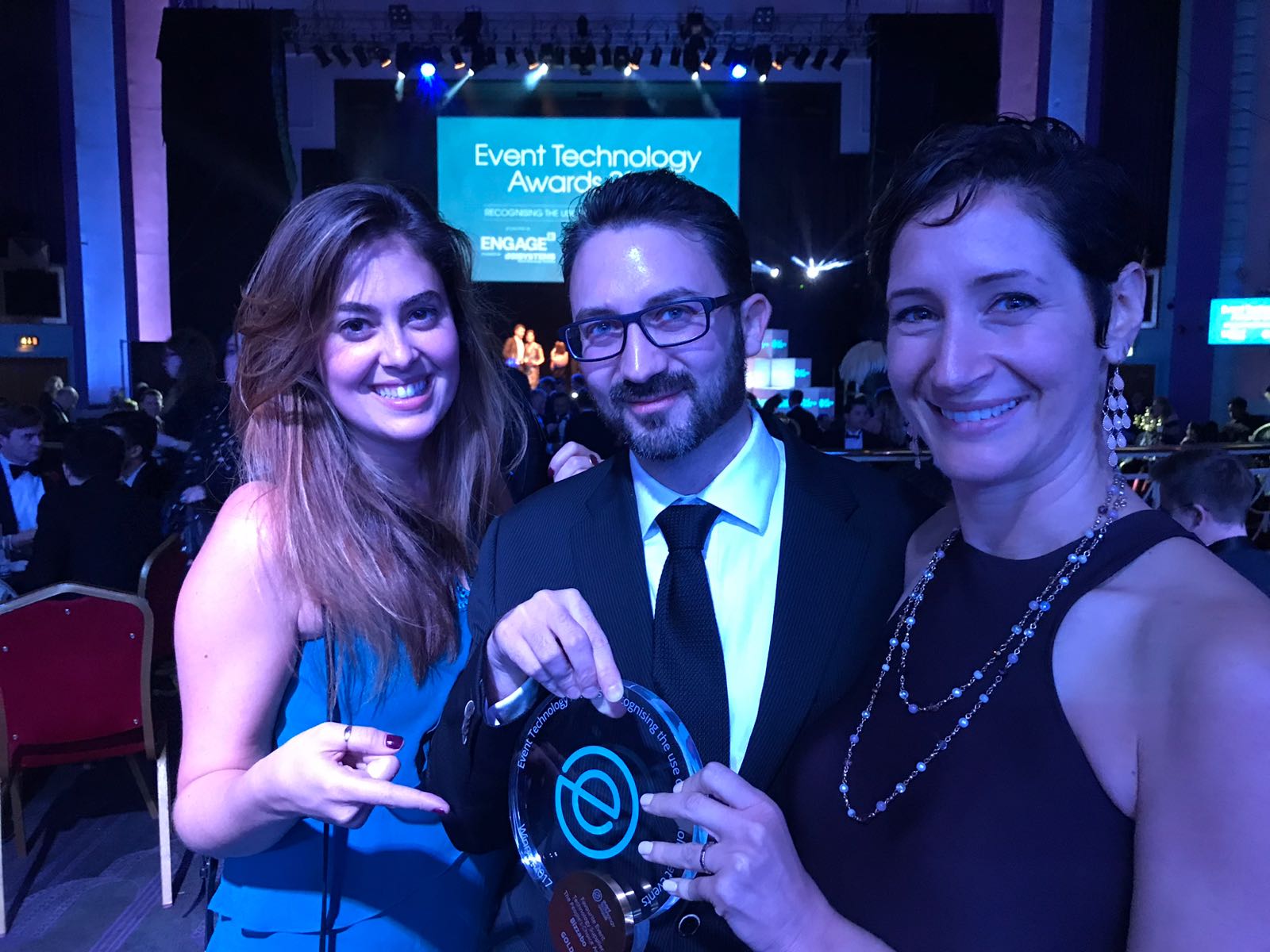 The Bizzabo crew holding the People's Choice Award The Bizzabo crew holding the People's Choice Award